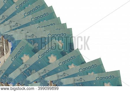 5 Canadian Dollars Bills Lies Isolated On White Background With Copy Space Stacked In Fan Close Up