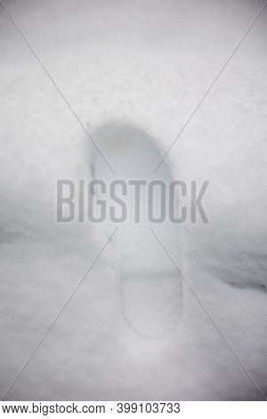 One Mans Footstep On The Fresh Friable Snow Footprint Of A Shoe In The Snow