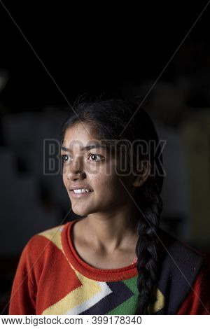 Dramatic Portrait Of An Indian Young Girl In Lowkey