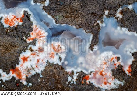 Blue Chalcedony Vein With Inclusion Of Red-white Zeolite Minerals In Brown Volcanic Rock