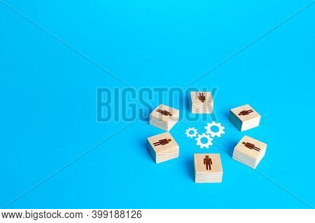 A Circle Of Figures Of People Surround Gears. Brainstorm. Joint Efforts To Solve Problems. Teamwork.