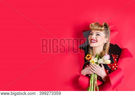 Advertising. Pin Up Girl With Flowers. Smiling Retro Woman Hold Flowers Through Hole In Paper. Woman