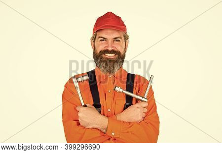 Used To Unwind Or Tighten Nuts And Bolts. Tools For Repair. Happy Man Worker. Knowing How To Change 