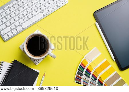 Designer Desk Top View With Computer Keyboard, Graphic Tablet Color Palette, Notebook, Cup Of Coffee