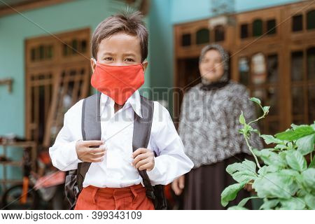 Indonesian Asian Primary Student Wearing A Masks