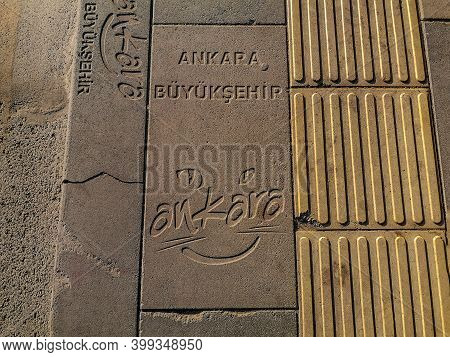 Turkey, Ankara - October 23, 2019: Paving Slabs With Engraving Ankara Buyuksehir, Close-up. Old Ston