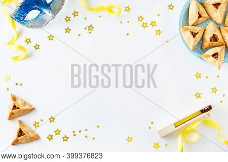 Purim Celebration Concept (jewish Carnival Holiday) On White Background, Top View, Copy Space. Purim