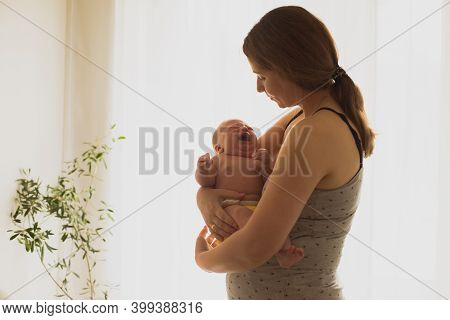 Woman In Postpartum Depression Feeling Unemotional And Exhausted