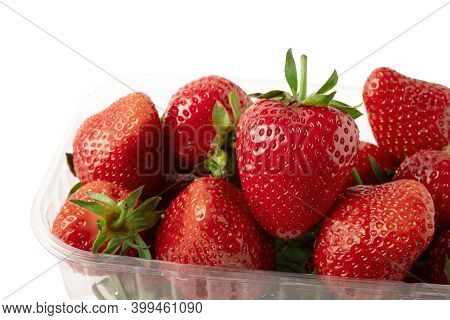 Strawberries Front-view Isolated On White Background. Heart Shape Strawberry In Plastic Basket Conta