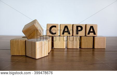 Capa Symbol. Concept Word 'capa, Corrective And Preventive Actions' On Wooden Cubes On A Beautiful W
