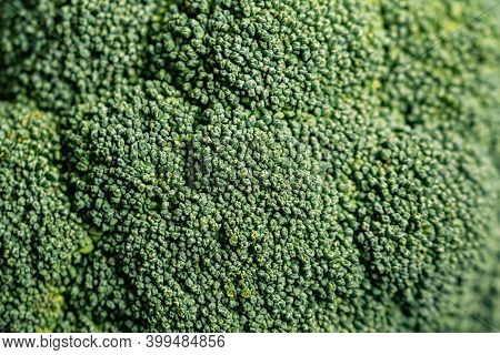 Closeup Macro Shot Of Broccoli Cabbage. Green Healthy Background With Vegetable Broccoli Texture. He