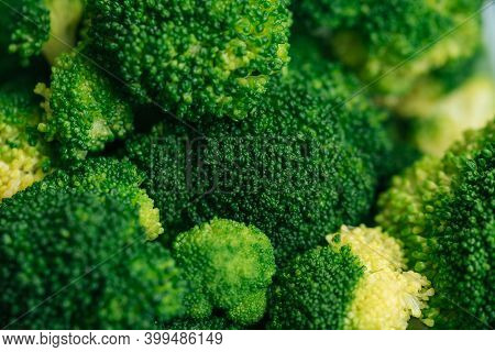 Closeup Macro Shot Of Broccoli Cabbage. Green Healthy Background With Vegetable Broccoli Texture. He