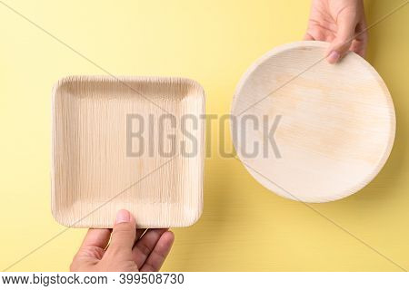 Hand Holding Betal Palm Leaf Plate (biodegradable, Compostable, Disposable Or Eco Friendly Plate) On