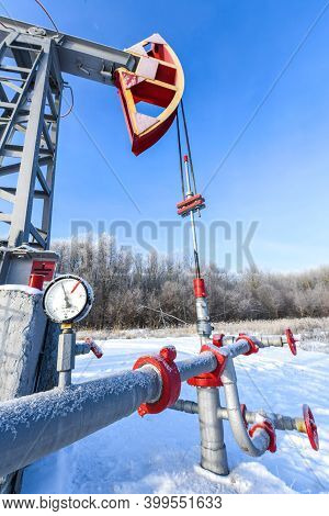 Oil Pumpjack Winter Work. Oil Pressure Gauge Shows 10 Atm (max 15 Bar - Red Line). Oil Pumpjack. A P