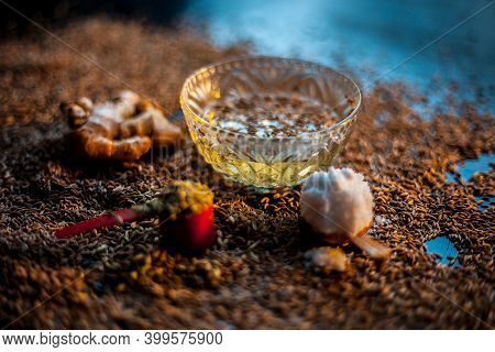 Shot Of Cumin Seeds, Sea Salt, Ginger Powder,fennel Seeds On Brown Surface For Curing Bloating.