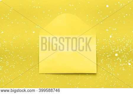 Color Trend 2021 - Yellow Envelope On A Yellow Background. Flat Lay Concept For Valentines Day, Woma
