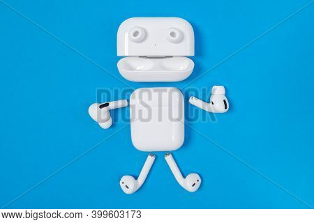 Rostov, Russia - July 06, 2020: Funny Little Man With Arms, Legs And Eyes Made Of Apple Wireless Hea