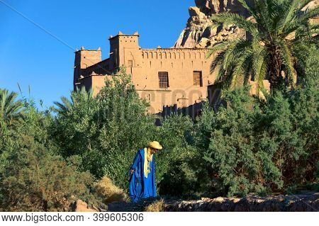 AIT BENHADDOU, MOROCCO, 24 JUNE, 2020: Local people at Ait Benhaddou kasbah, along the former caravan route between Sahara and Marrakesh, Morocco