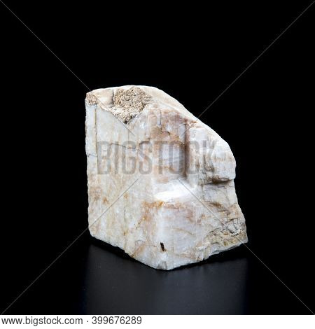 Close Up Of White Baryte Stone Isolated On Black Background. Geological Mineral For Geological Colle