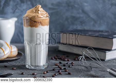 Atmospheric Shot Of Dalgone Coffee. Delicious Milk Drink With Coffee Foam.