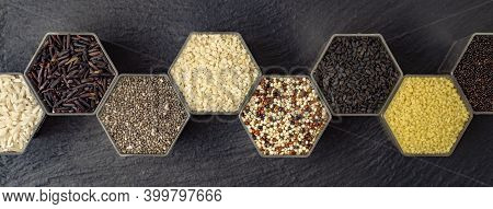 Various Cereals And Grains In The Hexagonal Shaped Honeycomb Jars