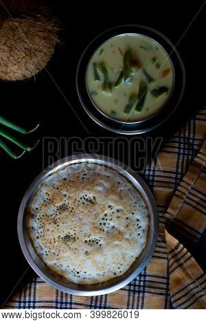 Homemade Tasty Set Dosa Along With Vegetable Stew On A Dark Background