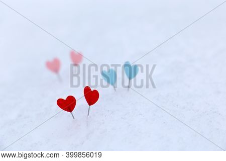 Red, Blue And Pink Hearts On A Snow. Diversity Of Love, Background For Romantic Greeting Card, Valen
