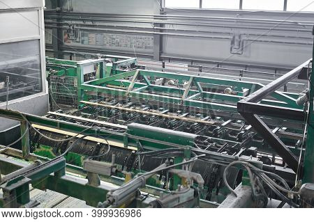 Interior Of An Automated Workshop For The Production Of Boards At A Modern Sawmill