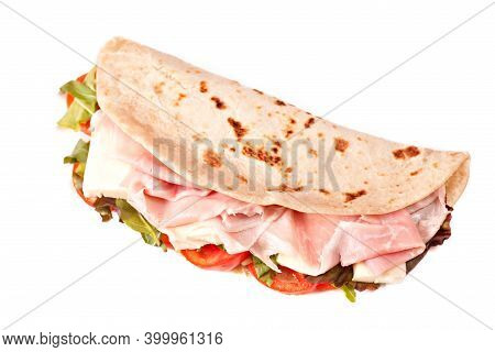 Traditional Italian Piadina With Ham, Cheese, Tomato And Salad.