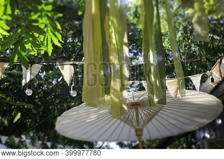 Hanging Colorful Fabric Decorated In The Garden, Stock Photo