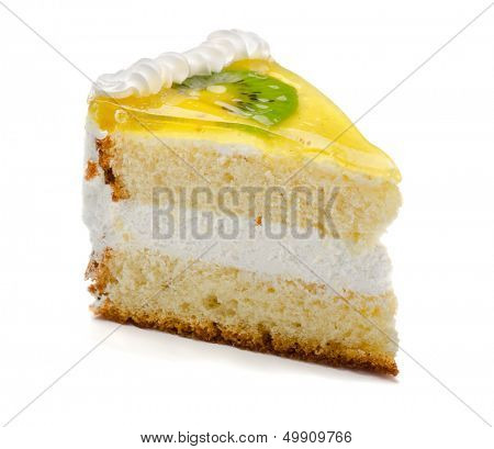 Slice of delicious fruit kiwi cake isolated on white