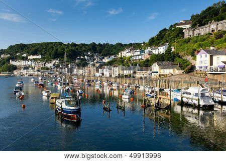Boats and yachts Looe Cornwall with blue sea and sky