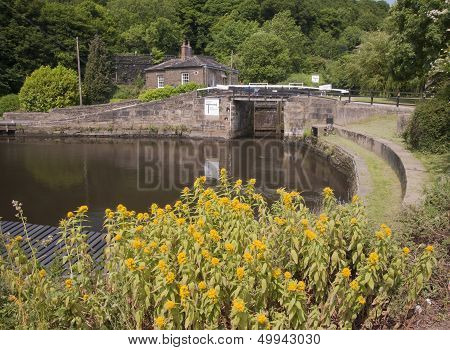 Lock and pool on the Calder and Hebble canal at Halifax in West Yorkshire