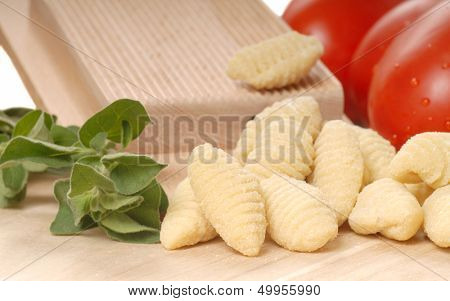 Delicious hand made Gnocchi using a Gnocchi board with tomatoes and herbs