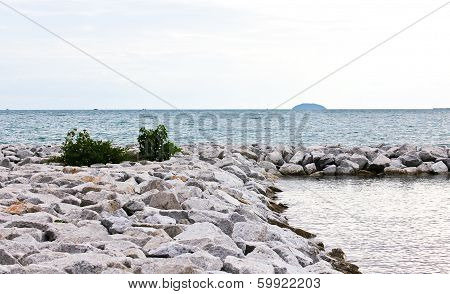 Breakwall Rocks At Sea Coast In Thailand.