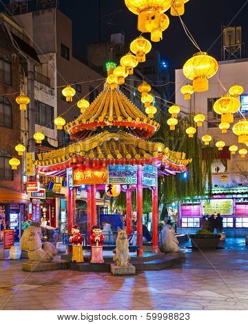 KOBE, JAPAN - NOVEMBER 26, 2012: Kobe Chinatown in the evening. It is one of three designated Chinatowns in Japan.