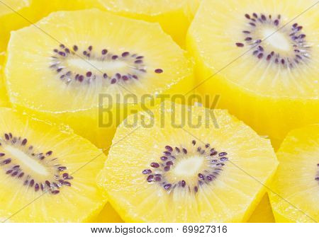 Full Frame Of Yellow Kiwi Fruit Sliced.