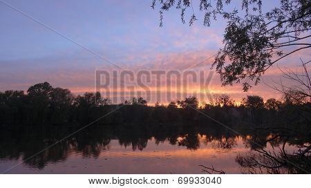 Sunset at the river bank