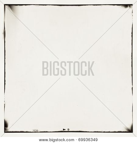medium format film frame background. Texture contains grain, dust and light leaks