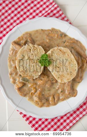 Dumplings with chanterelle mushroom sauce