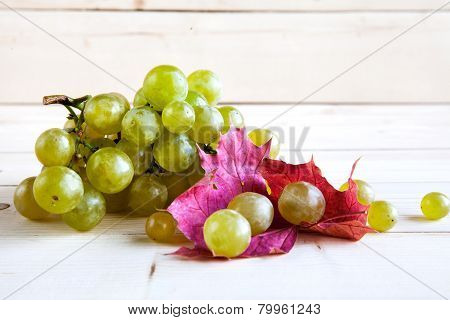 Grapes On A Wooden Table