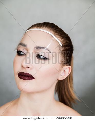 Beautiful Young Woman With Professional Makeup. Fashion Image With Professional Cosmetics. Neat Youn