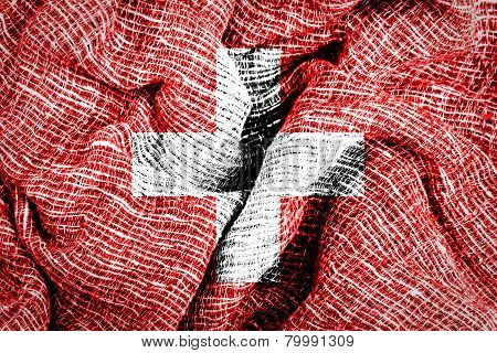 Switzerland flag on fabric surface