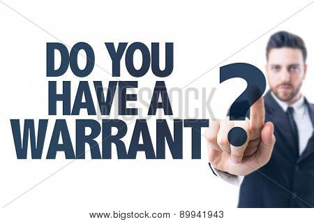 Business man pointing the text: Do You Have a Warrant?