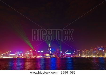 Hong Kong Skyline At Night With Laser Beams