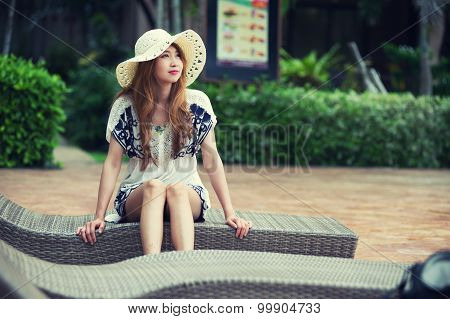 Asia beautiful relex on lounger near swimming pool in hotel krabi Thailand