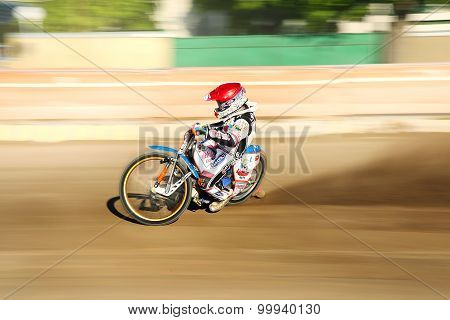 Speedway rider on the track
