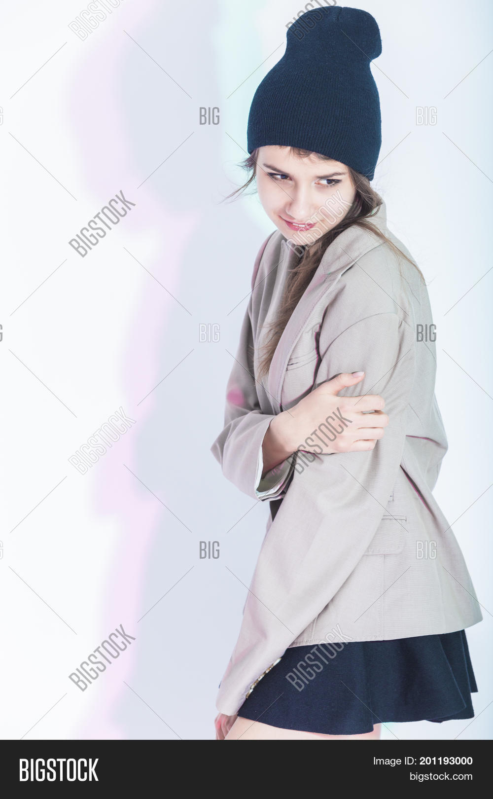 portrait of happy and glad exclaiming thin brunette girl in