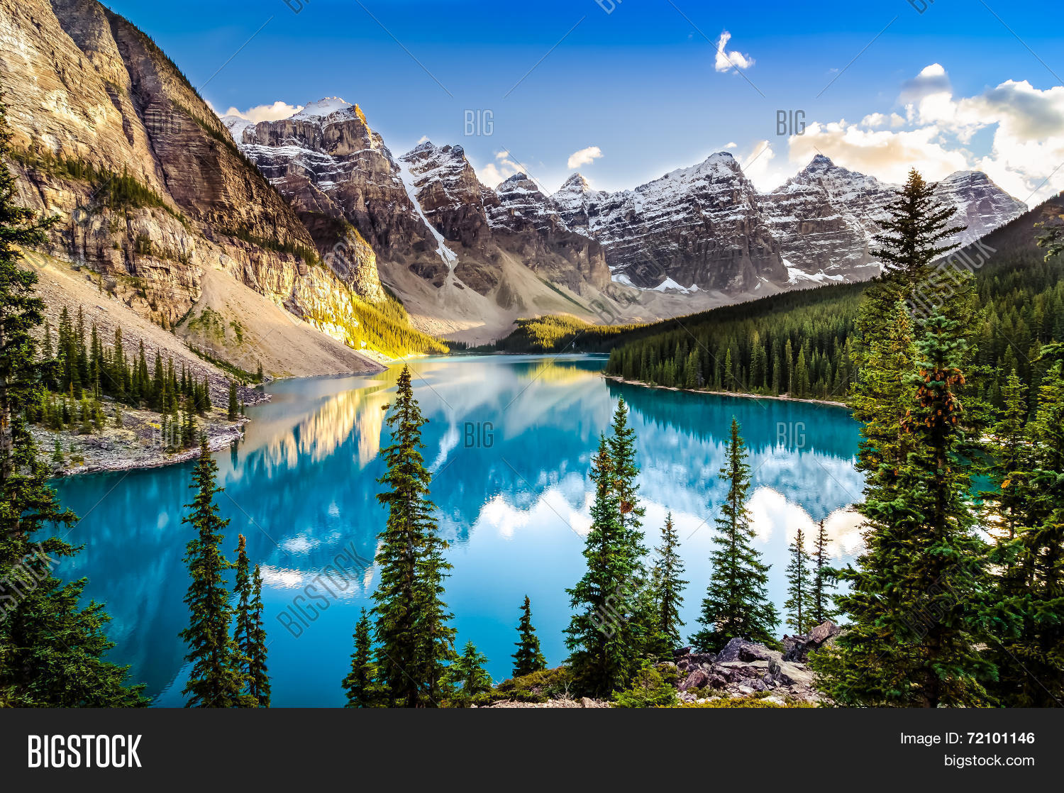 landscape sunset view of morain lake and mountain range