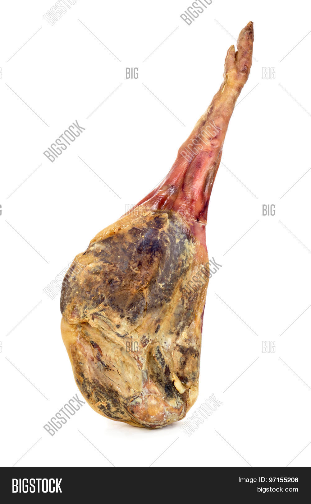 a leg of spanish jamon serrano, dry cured ham, on a white back